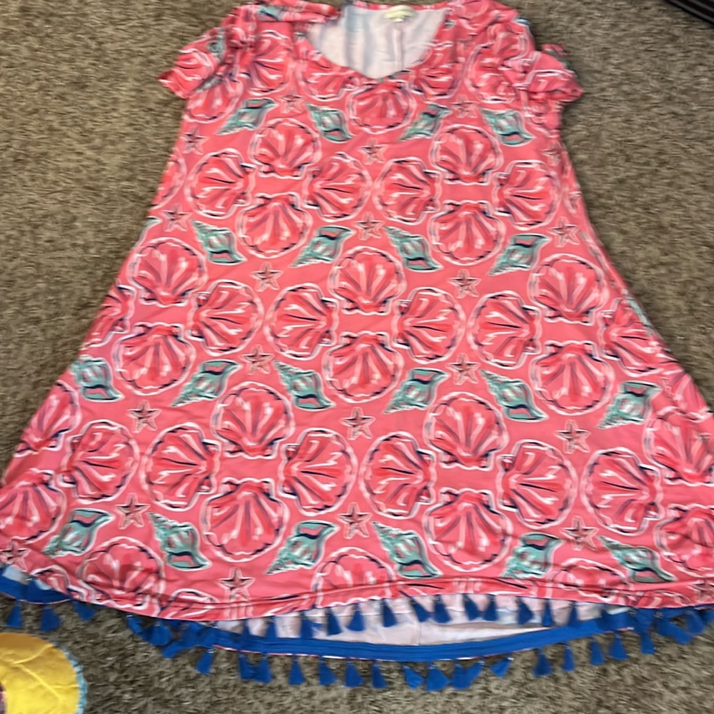 A bright , cute beach, dress, or cover-up